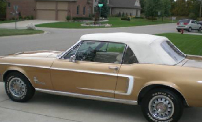 Very nice 1968 mustang convertible,289 engine, automatic, power steering, power disc brakes, electric roof, rare factory gold colour, white interior.